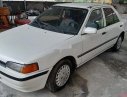 Mazda 323 1998 - Cần bán xe Mazda 323 sản xuất năm 1998, màu trắng, nhập khẩu, 45tr