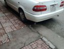 Toyota Corolla 1998 - Cần bán Toyota Corolla đời 1998, màu trắng xe gia đình, 90tr