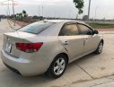 Kia Forte EX 1.6 MT 2011 - Cần bán Kia Forte EX 1.6 MT đời 2011, màu vàng, giá 295tr