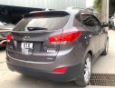 Hyundai Tucson 2011 - Cần bán xe Hyundai Tucson sản xuất năm 2011, màu xám, nhập khẩu, giá tốt