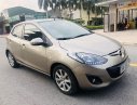 Mazda 2 2014 - Bán xe Mazda 2 đời 2014, màu vàng