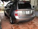 Kia Carens 2009 - Cần bán lại xe Kia Carens 2009, màu vàng