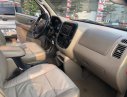 Ford Escape   2004 - Cần bán lại xe Ford Escape 3.0V 2004, màu vàng, số tự động