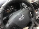 Kia Carens 2009 - Cần bán lại xe Kia Carens 2009, màu vàng