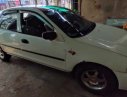 Mazda 323   1998 - Bán ô tô Mazda 323 đời 1998, màu trắng xe gia đình