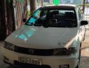 Mazda 323   1998 - Bán ô tô Mazda 323 đời 1998, màu trắng xe gia đình