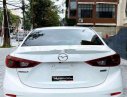 Mazda 3  AT 2015 - Cần bán lại xe Mazda 3 AT đời 2015, màu trắng, xe nhập