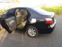 Toyota Vios E 2010 - Bán ô tô Toyota Vios E MT sản xuất 2010, màu đen số sàn, giá 274tr