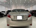 Toyota Vios 1.5E 2014 - Bán Toyota Vios 1.5E 2014, màu nâu chính chủ, 383 triệu