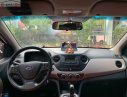 Hyundai Grand i10 1.0AT 2015 - Cần bán lại xe Hyundai Grand i10 1.0AT sản xuất năm 2015, màu trắng, nhập khẩu nguyên chiếc chính chủ, giá 320tr