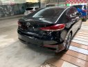 Hyundai Elantra 2016 - Bán xe Hyundai Elantra sản xuất năm 2016, màu đen số sàn