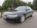 Mazda 626 2000 - Bán Mazda 626 năm sản xuất 2000, màu đen, 70 triệu