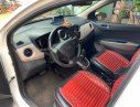 Hyundai Grand i10 1.0AT 2015 - Cần bán lại xe Hyundai Grand i10 1.0AT sản xuất năm 2015, màu trắng, nhập khẩu nguyên chiếc chính chủ, giá 320tr