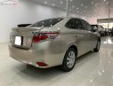 Toyota Vios 1.5E 2014 - Bán Toyota Vios 1.5E 2014, màu nâu chính chủ, 383 triệu