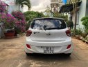 Hyundai Grand i10 1.0AT 2015 - Cần bán lại xe Hyundai Grand i10 1.0AT sản xuất năm 2015, màu trắng, nhập khẩu nguyên chiếc chính chủ, giá 320tr