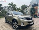 Kia Sorento 2015 - Cần bán lại xe Kia Sorento sản xuất năm 2015, màu vàng