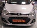 Hyundai Grand i10 2015 - Cần bán gấp Hyundai Grand i10 năm 2015, màu bạc, nhập khẩu chính chủ