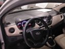 Hyundai Grand i10 2015 - Cần bán gấp Hyundai Grand i10 năm 2015, màu bạc, nhập khẩu chính chủ