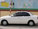 Daewoo Lanos 2003 - Cần bán lại xe Daewoo Lanos sản xuất 2003, màu trắng số sàn