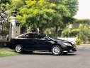 Toyota Camry  2.0E  2014 - Cần bán Toyota Camry 2.0E đời 2014, màu đen, giá tốt