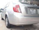 Daewoo Lacetti 2010 - Cần bán gấp Daewoo Lacetti đời 2010, màu bạc