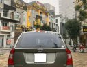 Kia Carens 2.0 MT 2010 - Bán Kia Carens 2.0 MT sản xuất 2010, màu xám xe gia đình