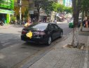 Toyota Camry 2016 - Cần bán Toyota Camry E sản xuất 2016, màu đen chính chủ, 780 triệu