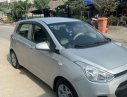 Hyundai Grand i10 2015 - Cần bán gấp Hyundai Grand i10 2015, màu bạc, nhập khẩu nguyên chiếc chính chủ