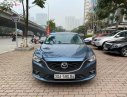 Mazda 6 2.0 AT 2015 - Cần bán gấp Mazda 6 2.0 AT đời 2015, màu xanh lam chính chủ, giá chỉ 646 triệu