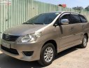 Toyota Innova 2013 - Cần bán gấp Toyota Innova E đời 2013, màu vàng