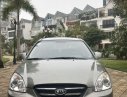 Kia Carens   2.0MT  2010 - Cần bán gấp Kia Carens 2.0MT sản xuất năm 2010, màu xám xe gia đình