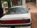 Mazda 323 1998 - Cần bán lại xe Mazda 323 đời 1998, màu trắng