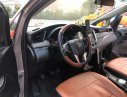 Toyota Innova 2.0E 2017 - Cần bán lại xe Toyota Innova 2.0E 2017, màu nâu
