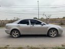 Mazda 6 2004 - Cần bán gấp Mazda 6 đời 2004, màu bạc