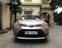 Toyota Vios 2018 - Cần bán lại xe Toyota Vios 1.5E đời 2018, màu vàng xe gia đình