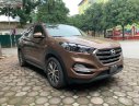 Hyundai Tucson 2016 - Cần bán xe Hyundai Tucson sản xuất 2016, màu nâu, nhập khẩu nguyên chiếc