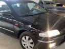 Mazda 323   2000 - Bán Mazda 323 năm 2000, màu đen xe gia đình