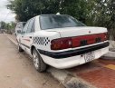 Mazda 323 1995 - Bán ô tô Mazda 323 đời 1995, màu trắng