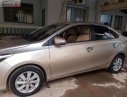 Toyota Vios 2016 - Bán ô tô Toyota Vios sản xuất 2016, màu vàng xe gia đình, 448 triệu