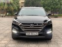 Hyundai Tucson 2015 - Cần bán gấp Hyundai Tucson sản xuất năm 2015, màu đen, nhập khẩu, 725 triệu