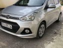 Hyundai Grand i10   2015 - Cần bán lại xe Hyundai Grand i10 năm 2015, màu bạc, nhập khẩu nguyên chiếc, giá 235tr