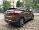 Hyundai Tucson 2016 - Cần bán xe Hyundai Tucson sản xuất 2016, màu nâu, nhập khẩu nguyên chiếc