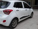 Hyundai Grand i10 2014 - Cần bán gấp Hyundai Grand i10 năm sản xuất 2014, màu trắng, nhập khẩu hàn quốc