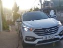 Hyundai Santa Fe 4WD 2017 - Cần bán lại xe Hyundai Santa Fe 4WD năm 2017, màu trắng số tự động