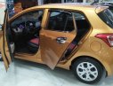 Hyundai Grand i10 1.0 MT Base 2014 - Cần bán xe Hyundai Grand i10 1.0 MT Base đời 2014, màu vàng, nhập khẩu chính chủ