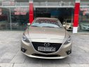 Mazda 3 2016 - Cần bán gấp Mazda 3 1.5 AT sản xuất năm 2016, màu vàng giá cạnh tranh