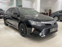 Toyota Camry 2.0E 2019 - Cần bán lại xe Toyota Camry 2.0E đời 2019, màu đen, 950tr