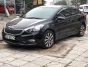 Kia K3 2014 - Bán Kia K3 1.6 MT năm sản xuất 2014, màu đen số tự động