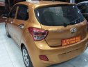 Hyundai Grand i10 1.0 MT Base 2014 - Cần bán xe Hyundai Grand i10 1.0 MT Base đời 2014, màu vàng, nhập khẩu chính chủ