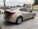 Mazda 3 2016 - Cần bán gấp Mazda 3 1.5 AT sản xuất năm 2016, màu vàng giá cạnh tranh